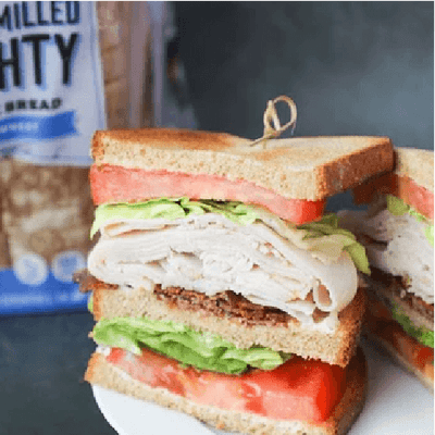 Triple-Decker Turkey Club with Lemon Aioli & Herbed Tomatoes